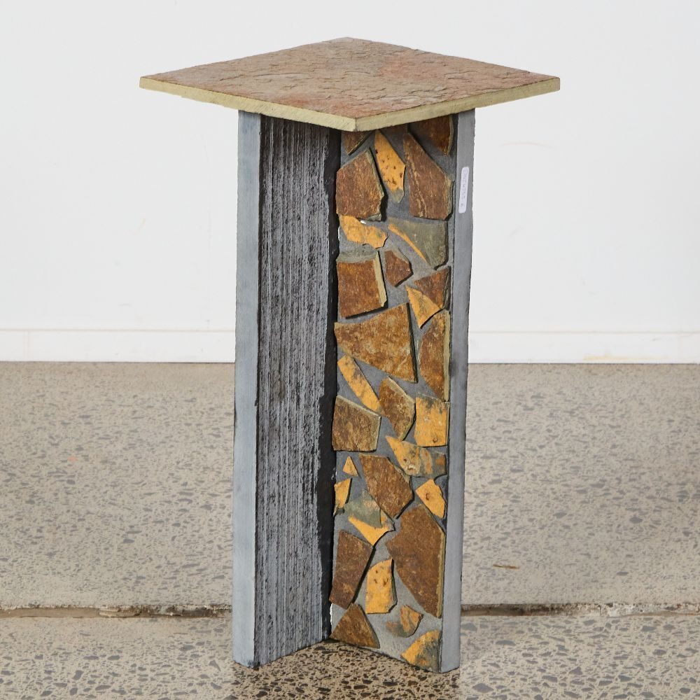 Close-up detail of an OxMont's side table, a fitted mosaic of broken slate pieces